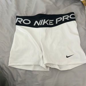white Nike pros